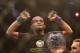 September 22, 2012; Toronto, ON, CANADA; Demetrious Johnson celebrates his win over Joseph Benavidez (not pictured) in the flyweight championship during UFC 152 at the Air Canada Centre. Mandatory Credit: Tom Szczerbowski-USA TODAY Sports