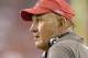 TAMPA, FL - AUGUST 10: Defensive Coordinator Monte Kiffin of the Tampa Bay Buccaneers checks the scoreboard during a preseason game against the New England Patriots at Raymond James Stadium on August 10, 2007 in Tampa, Florida. The Bucs won 13 - 10. (Photo by Al Messerschmidt/Getty Images)