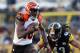 Dec 23, 2012; Pittsburgh, PA, USA; Cincinnati Bengals wide receiver A.J. Green (18) runs the ball past Pittsburgh Steelers safety Troy Polamalu (43) during the second half of the game at Heinz Field. The Bengals won the game, 13-10. Mandatory Credit: Jason Bridge-USA TODAY Sports