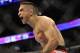 Jan 26, 2013; Chicago, IL, USA; Ricardo Lamas celebrates after defeating Erik Koch (not pictured) during UFC on FOX 6 at the United Center. Mandatory Credit: David Banks-USA TODAY Sports