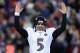 FOXBORO, MA - JANUARY 20: Joe Flacco #5 of the Baltimore Ravens celebrates after a touchdown ran by Ray Rice #27 in the second quarter against the New England Patriots during the 2013 AFC Championship game at Gillette Stadium on January 20, 2013 in Foxboro, Massachusetts. (Photo by Al Bello/Getty Images)