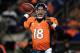 DENVER, CO - JANUARY 12: Peyton Manning #18 of the Denver Broncos throws an 17-yard touchdown pass to Demaryius Thomas #88 in the third quarter against the Baltimore Ravens during the AFC Divisional Playoff Game at Sports Authority Field at Mile High on January 12, 2013 in Denver, Colorado. (Photo by Doug Pensinger/Getty Images)