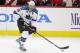 February 13, 2012; Washington, DC, USA; San Jose Sharks center Joe Thornton (19) skates with the puck against the Washington Capitals at Verizon Center. Mandatory Credit: Geoff Burke-USA TODAY Sports