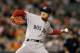 BALTIMORE, MD - APRIL 26: Pitcher Hideki Okajima #37 of the Boston Red Sox delivers to a Baltimore Orioles batter during the seventh inning at Oriole Park at Camden Yards on April 26, 2011 in Baltimore, Maryland. (Photo by Rob Carr/Getty Images)