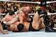 CM Punk locks in the Anaconda Vise on The Rock. (Courtesy of WWE.com)