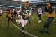Dec 23, 2012; East Rutherford, NJ, USA; New York Jets quarterback Tim Tebow (15) runs off the field after the Jets 27-17 loss to the San Diego Chargers at MetLIfe Stadium. The Chargers defeated the Jets 27-17. Mandatory Credit: Ed Mulholland-USA TODAY Sports