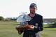 SCOTTSDALE, AZ - FEBRUARY 05: Kyle Stanley poses with the trophy after winning the Waste Management Phoenix Open at TPC Scottsdale on February 5, 2012 in Scottsdale, Arizona. (Photo by Christian Petersen/Getty Images)