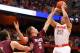 SYRACUSE, NY - NOVEMBER 25: Brandon Triche #20 of the Syracuse Orange shoots the ball against Pat Moore #5 and John Brandenburg #3 of the Colgate Raiders during the game at the Carrier Dome on November 25, 2012 in Syracuse, New York. (Photo by Nate Shron/Getty Images)