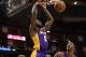 Dec 4, 2012; Houston, TX, USA; Los Angeles Lakers small forward Earl Clark (6) dunks the ball during the first quarter against the Houston Rockets at Toyota Center. Mandatory Credit: Troy Taormina-USA TODAY Sports
