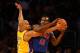 LOS ANGELES, CA - NOVEMBER 17: Will Bynum #12 of the Detroit Pistons is defended by Derek Fisher #2 of the Los Angeles Lakers in the second half at Staples Center on November 17, 2009 in Los Angeles, California. The Lakers defeated the Pistons 106-93. NOTE TO USER: User expressly acknowledges and agrees that, by downloading and/or using this Photograph, user is consenting to the terms and conditions of the Getty Images License Agreement. (Photo by Jeff Gross/Getty Images)