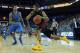 LOS ANGELES, CA - JANUARY 30: Eric Wise #34 of the USC Trojans drives around Kyle Anderson #5 of the UCLA Bruins in the first half at Pauley Pavilion on January 30, 2013 in Los Angeles, California. (Photo by Jeff Gross/Getty Images)