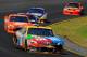 LONG POND, PA - AUGUST 05: Kyle Busch, driver of the #18 M&M's Toyota, leads a pack of cars during the NASCAR Sprint Cup Series Pennsylvania 400 at Pocono Raceway on August 5, 2012 in Long Pond, Pennsylvania. (Photo by Jared C. Tilton/Getty Images)