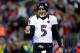 FOXBORO, MA - JANUARY 20: Joe Flacco #5 of the Baltimore Ravens celebrates after a touchdown ran by Ray Rice #27 in the second quarter against the New England Patriots during the 2013 AFC Championship game at Gillette Stadium on January 20, 2013 in Foxboro, Massachusetts. (Photo by Al Bello/Getty Images)