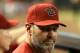 PHOENIX, AZ - OCTOBER 03: Manager Kirk Gibson of the Arizona Diamondbacks watches from the dugout during the MLB game against the Colorado Rockies at Chase Field on October 3, 2012 in Phoenix, Arizona. (Photo by Christian Petersen/Getty Images)