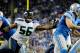 Oct 28, 2012; Detroit, MI, USA; Seattle Seahawks outside linebacker Leroy Hill (56) pressures Detroit Lions quarterback Matthew Stafford (9) during the third quarter at Ford Field. Detroit won 28-24. Mandatory Credit: Tim Fuller-USA TODAY Sports