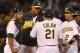OAKLAND, CA - AUGUST 18: Bob Melvin #6 of the Oakland Athletics talks to Bartolo Colon #21 on the pitchers mound during the eighth inning against the Cleveland Indians at O.co Coliseum on August 18, 2012 in Oakland, California. (Photo by Jason O. Watson/Getty Images)