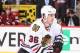 Dave Bolland is staying with the Chicago Blackhawks as they continue their road trip after suffering a leg injury Friday night.