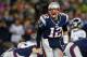 FOXBORO, MA - JANUARY 20: Tom Brady #12 of the New England Patriots makes an adjustment at the line against the Baltimore Ravens during the 2013 AFC Championship game at Gillette Stadium on January 20, 2013 in Foxboro, Massachusetts. (Photo by Jim Rogash/Getty Images)