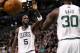 Feb 3, 2013; Boston, MA, USA; Boston Celtics power forward Kevin Garnett (5) and power forward Brandon Bass (30) celebrate during the second half of a game against the Los Angeles Clippers at TD Garden. Mandatory Credit: Mark L. Baer-USA TODAY Sports