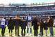 EAST RUTHERFORD, NJ - DECEMBER 30: Martellus Bennett #85 of the New York Giants stands with families of Sandy Hook Elementary School before the game against the Philadelphia Eagles their game against the at MetLife Stadium on December 30, 2012 in East Rutherford, New Jersey. (Photo by Al Bello/Getty Images)