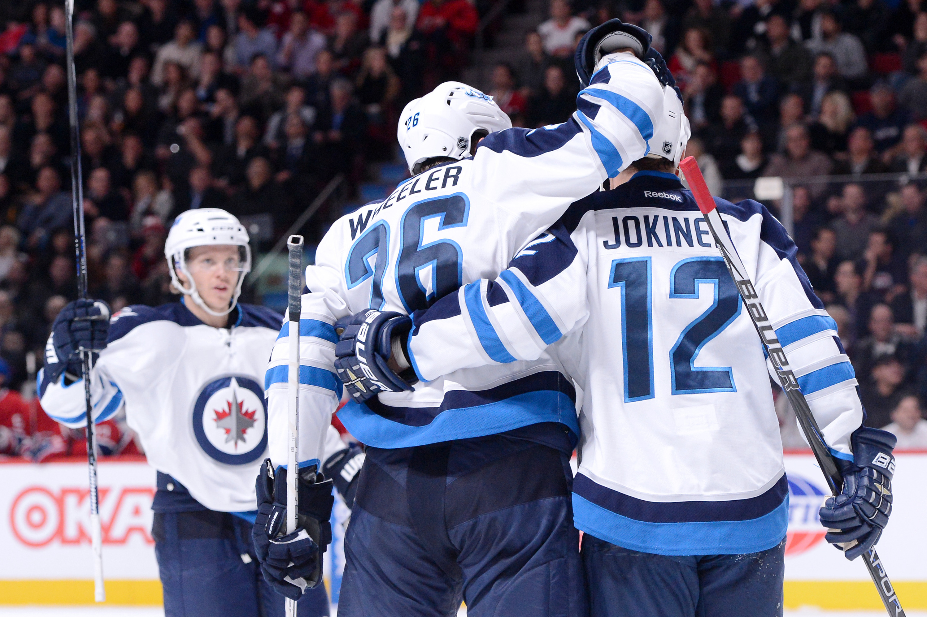 Wheeler, Scheifele help Jets edge Oilers