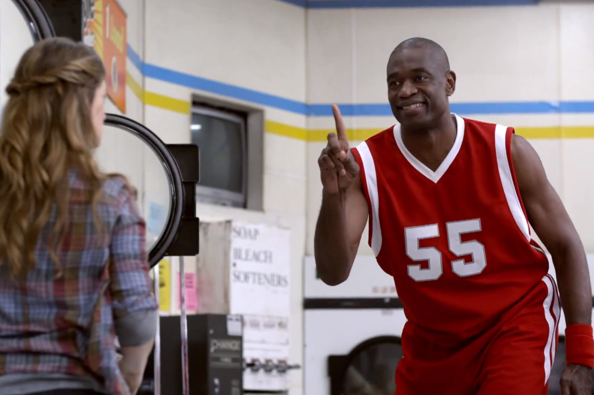 Dikembe Mutombo blocks for GEICO in Super Bowl commercial