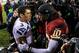 Jan 6, 2013; Landover, MD, USA; Washington Redskins quarterback Robert Griffin III (10) and Seattle Seahawks quarterback Russell Wilson (3) shake hands after the NFC Wild Card playoff game at FedEx Field. The Seahawks won 24-14. Mandatory Credit: Daniel Shirey-USA TODAY Sports
