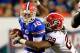 JACKSONVILLE, FL - OCTOBER 29: Jarvis Jones #29 of the Georgia Bulldogs tackles John Brantley #12 of the Florida Gators during the game at EverBank Field on October 29, 2011 in Jacksonville, Florida. (Photo by Sam Greenwood/Getty Images)