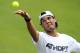 LONDON, ENGLAND - JUNE 24: Rafael Nadal of Spain serves in a practice session during previews for the Wimbledon Championships 2012 at Wimbledon on June 24, 2012 in London, England. (Photo by Julian Finney/Getty Images)