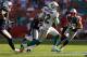 MIAMI GARDENS, FL - DECEMBER 02: Brian Hartline #82 of the Miami Dolphins rushes after a catch during a game against the New England Patriots at Sun Life Stadium on December 2, 2012 in Miami Gardens, Florida. (Photo by Mike Ehrmann/Getty Images)