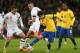 LONDON, ENGLAND - FEBRUARY 06: Jack Wilshere of England and Oscar of Brazil battle for the ball during the International friendly between England and Brazil at Wembley Stadium on February 6, 2013 in London, England. (Photo by Clive Brunskill/Getty Images)