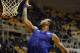 MORGANTOWN, WV - JANUARY 28: Travis Releford #24 of the Kansas Jayhawks rolls one in against the West Virginia Mountaineers at the WVU Coliseum on January 28, 2013 in Morgantown, West Virginia. (Photo by Justin K. Aller/Getty Images)