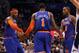 January 5, 2013; Orlando FL, USA; New York Knicks power forward Amar'e Stoudemire (1), small forward Carmelo Anthony (7) and shooting guard J.R. Smith (8) high five against the Orlando Magic during the first quarter at Amway Center. Mandatory Credit: Kim Klement-USA TODAY Sports