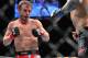 Dec 29, 2012; Las Vegas, NV, USA; Brad Pickett (left) and Eddie Wineland (right) during UFC 155 at the MGM Grand Garden Arena. Mandatory Credit: Gary A. Vasquez-USA TODAY Sports