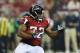 ATLANTA, GA - JANUARY 13: Jacquizz Rodgers #32 of the Atlanta Falcons carries the ball against the Seattle Seahawks during the NFC Divisional Playoff Game at Georgia Dome on January 13, 2013 in Atlanta, Georgia. (Photo by Streeter Lecka/Getty Images)