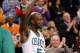 BOSTON, MA - FEBRUARY 7: Kevin Garnett #5 of the Boston Celtics acknowledges the crowd after being recognized for scoring 25,0000 points in his career against the Los Angeles Lakers during the game on February 7, 2013 at TD Garden in Boston, Massachusetts. NOTE TO USER: User expressly acknowledges and agrees that, by downloading and or using this photograph, User is consenting to the terms and conditions of the Getty Images License Agreement. (Photo by Jared Wickerham/Getty Images)