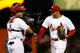 ST LOUIS, MO - OCTOBER 08: (R) Carlos Beltran #3 and Yadier Molina #4 of the St. Louis Cardinals celebrate after the Cardinals defeat the Washington Nationals 12-4 in Game Two of the National League Division Series at Busch Stadium on October 8, 2012 in St Louis, Missouri. (Photo by Jamie Squire/Getty Images)