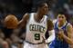 Jan 16, 2013; Boston, Massachusetts, USA; New Orleans Hornets guard Austin Rivers (25) chases after Boston Celtics point guard Rajon Rondo (9) on a fast break during the second quarter at TD Banknorth Garden. Mandatory Credit: Greg M. Cooper-USA TODAY Sports