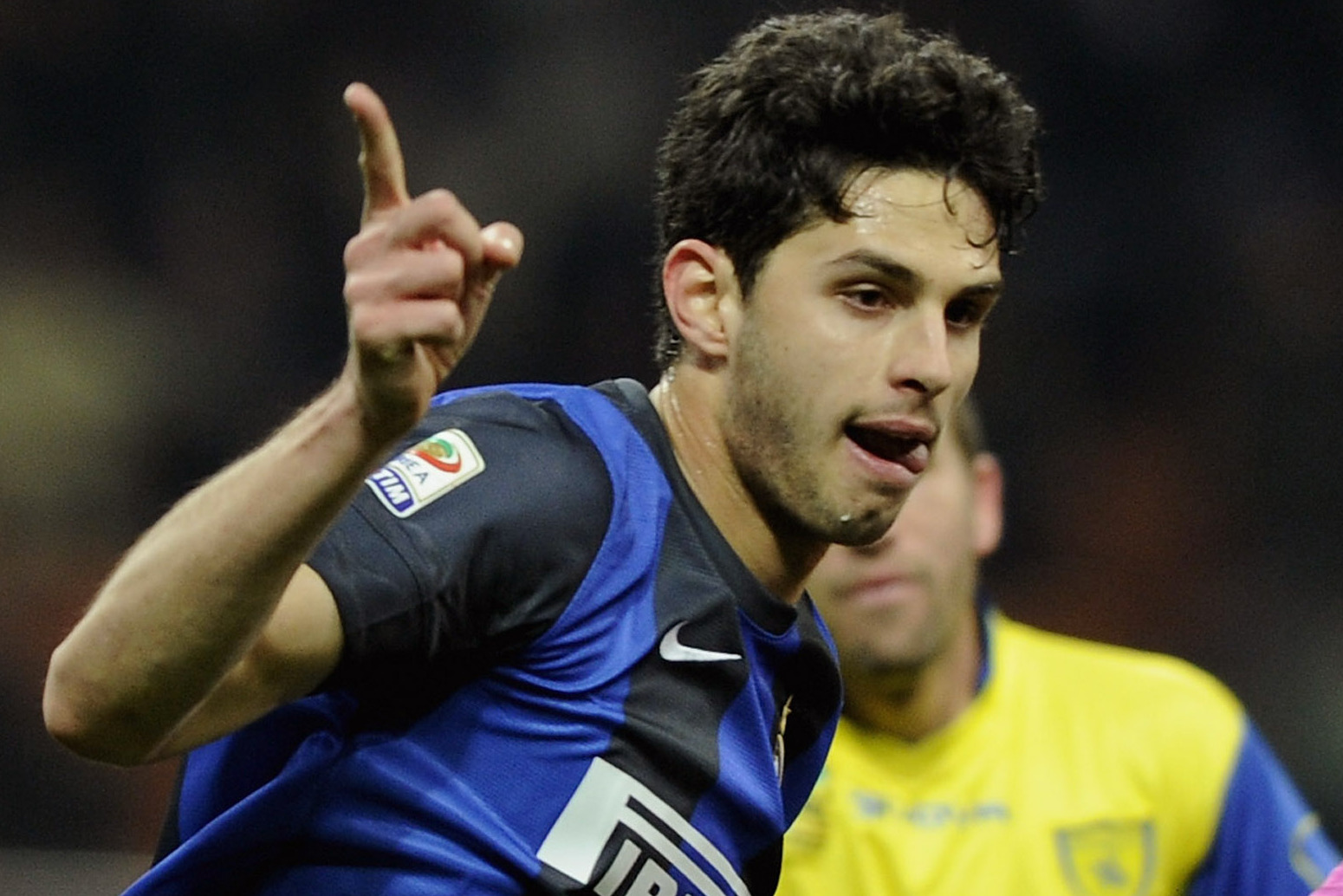 Inter Milan defender Andrea Ranocchia, right, challenges AC Milan