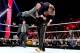 Photo: WWE.com. Brock Lesnar, a superstar with strong roots in amateur wrestling, F-5's Vince McMahon in an ironic foreshadowing of the IOC decision.