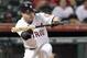 HOUSTON,TX - SEPTEMBER 22: Jose Altuve #27 of the Houston Astros lays down a sacrifice bunt in the seventh inning against the Pittsburgh Pirates at Minute Maid Park on September 22, 2012 in Houston, Texas. Houston won 4-1. (Photo by Bob Levey/Getty Images)
