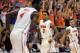 February 12, 2013; Gainesville, FL, USA; Florida Gators guard Mike Rosario (3) reacts with guard Scottie Wilbekin (5) and center Patric Young (4) against the Kentucky Wildcats during the first half at the Stephen C. O'Connell Center. Mandatory USA TODAY Sports