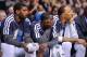 Jan 18, 2013; Dallas, TX, USA; Dallas Mavericks shooting guard O.J. Mayo (left) and point guard Darren Collison (center) and small forward Shawn Marion (right) watch their team take on the Oklahoma City Thunder at the American Airlines Center. The Thunder defeated the Mavericks in overtime 117-114. Mandatory Credit: Jerome Miron-USA TODAY Sports
