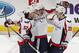 SUNRISE, FL - FEBRUARY 12: Alex Ovechkin #8 is congratulate by Mike Green #52 and Troy Brouwer #20 of the Washington Capitals after he scored a goal in the third period to tie the game against the Florida Panthers and send the game to overtime at the BB&T Center on February 12, 2013 in Sunrise, Florida. The Capitals defeated the Panthers 6-5 in overtime.(Photo by Joel Auerbach/Getty Images)