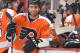 PHILADELPHIA, PA - FEBRUARY 09: Maxime Talbot #25 of the Philadelphia Flyers stands by the bench during the game against the Carolina Hurricanes at the Wells Fargo Center on February 9, 2013 in Philadelphia, Pennsylvania. (Photo by Drew Hallowell/Getty Images)