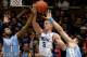 Feb 13, 2013; Durham, NC, USA; North Carolina Tar Heels guard Dexter Strickland (1) and forward Jackson Simmons (21) scramble with Duke Blue Devils forward Mason Plumlee (5) for the ball during the first half at Cameron Indoor Stadium. Mandatory Credit: Mark Dolejs-USA TODAY Sports