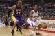 LOS ANGELES, CA - JANUARY 04: Chris Paul #3 of the Los Angeles Clippers keeps his dribble away from Kobe Bryant #24 of the Los Angeles Lakers during a 107-102 Clipper win at Staples Center on January 4, 2013 in Los Angeles, California. NOTE TO USER: User expressly acknowledges and agrees that, by downloading and or using this photograph, User is consenting to the terms and conditions of the Getty Images License Agreement. (Photo by Harry How/Getty Images)