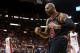 MIAMI, FL - JANUARY 04: Carlos Boozer #5 of the Chicago Bulls reacts to a three point play during a game against the Miami Heat at American Airlines Arena on January 4, 2013 in Miami, Florida. (Photo by Mike Ehrmann/Getty Images)
