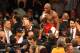 May 5, 2012; Las Vegas, NV, USA; Floyd Mayweather Jr. (center) is hoisted up after beating Miguel Cotto by unanimous decision at MGM Grand Garden Arena. Mandatory Credit: Jake Roth-USA TODAY Sports