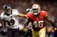 NEW ORLEANS, LA - FEBRUARY 03: Delanie Walker #46 of the San Francisco 49ers runs for yards after the catch against Cary Williams #29 of the Baltimore Ravens during Super Bowl XLVII at the Mercedes-Benz Superdome on February 3, 2013 in New Orleans, Louisiana. The Ravens won 34-31. (Photo by Ezra Shaw/Getty Images)